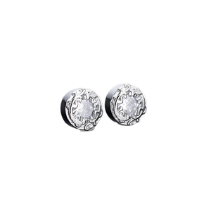 Vintage silver finish stud earrings with intricate carvings and sparkling cubic zirconia