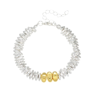 Silver beaded bracelet with gold accents and lobster clasp on white background