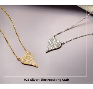 Detail of 925 sterling silver heart necklaces with pave set cubic zirconia stones