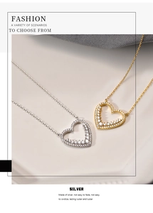 Close-up of S925 silver and gold heart necklaces featuring pavé set white zircon stones