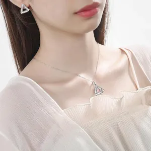 S925 sterling silver geometric triangle jewelry set with cubic zirconia on female model
