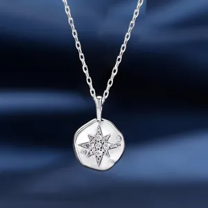 Elegant S925 sterling silver star pendant necklace with cubic zirconia on blue silk