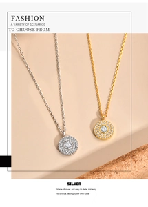 Detail of silver and gold round pendant necklaces with pave set cubic zirconia stones