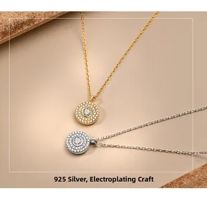 Close-up of S925 sterling silver necklaces with dual-layer pavé cubic zirconia pendants