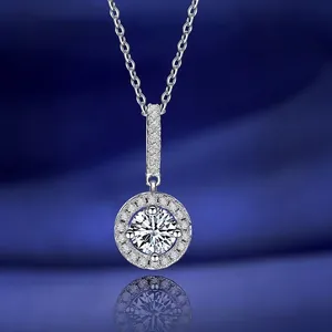 Elegant S925 sterling silver moissanite pendant necklace on dark blue silk background