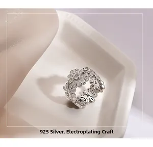 Macro shot of 925 sterling silver daisy ring with micro-pave zirconia petals detail