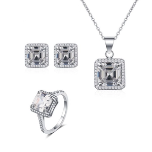 Macro shot of 925 silver jewelry set featuring square-cut sparkling cubic zirconia