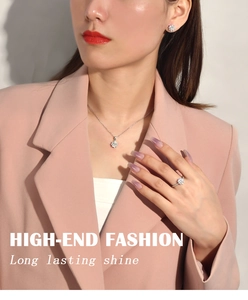 Model wearing S925 sterling silver snowflake jewelry set with necklace earrings and ring