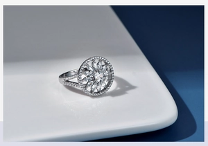 Detailed view of silver snowflake ring with marquise and round cubic zirconia stones