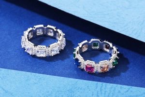 Detail of 925 sterling silver bands with clear and multicolor square zircon stones