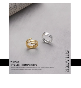 Detailed shot of S925 sterling silver minimalist spiral rings in gold and silver finish