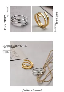 Macro detail of S925 sterling silver spiral wrap rings in gold and silver finishes