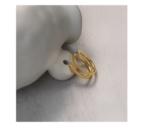 Detail of S925 sterling silver minimalist double-layer wrap ring with 18K gold finish