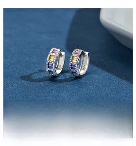 Close-up of S925 sterling silver hoop earrings with multicolored baguette-cut zircon