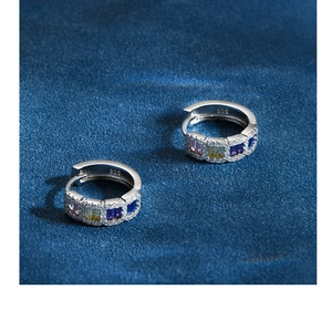 Macro view of S925 sterling silver hoop earrings with multi-color zircon inlay