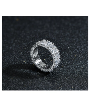 Macro shot of 925 sterling silver full eternity ring with square and round diamonds