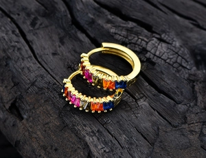 Close-up of S925 sterling silver gold hoop earrings with colorful zircon gemstones