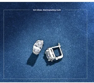 Detailed macro view of 925 sterling silver oval stud earrings with halo cubic zirconia
