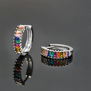 Elegant S925 sterling silver hoop earrings with rainbow zircon stones on black background