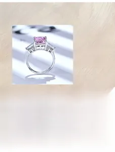 Detail of S925 sterling silver ring with 925 hallmark and pink ice flower cut zircon