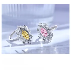 Macro detail of cluster rings with marquise-cut yellow and pink diamonds in s925 silver