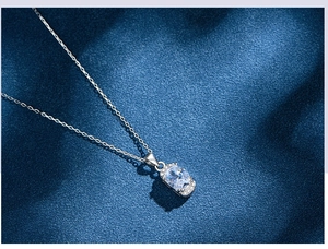 Detailed close-up of 925 sterling silver necklace featuring an oval cut gemstone pendant