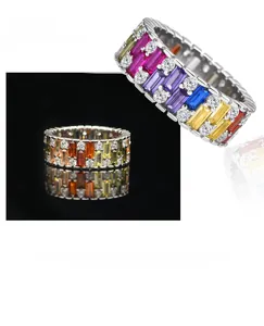 Macro detail of 925 sterling silver eternity ring with colorful rectangular gemstones