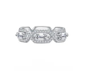 Macro detail of S925 silver ring featuring emerald-cut high carbon diamonds in a halo setting