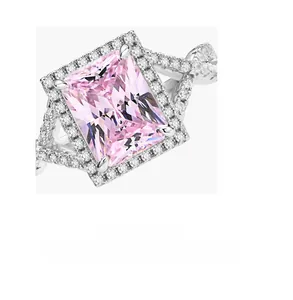 Macro shot of 7x9 pink radiant cut center stone with halo setting on s925 silver ring