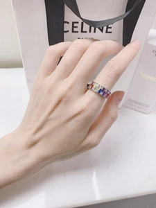 Macro shot of 925 silver rainbow ring with square multi-color zircon and small diamonds
