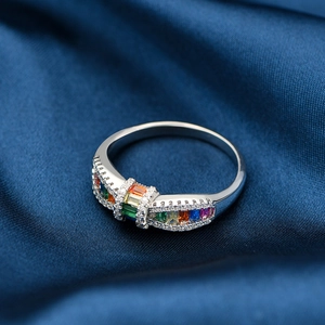 S925 sterling silver ring with rainbow rectangle zircons on dark blue silk background
