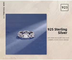 Close-up of S925 sterling silver ring with alternating rectangular and round cubic zirconia