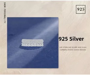 Macro detail of 925 sterling silver double-row micro-pave ring with sparkling cubic zirconia