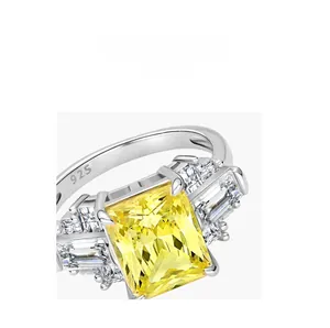 Macro view of S925 sterling silver ring with yellow radiant cut stone and claw setting