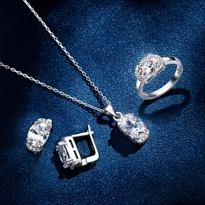 Elegant 925 sterling silver jewelry set featuring oval white gemstones and tiny diamonds