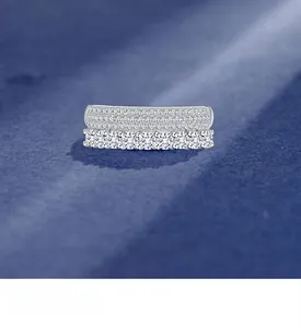 Close-up of double-row micro-set white zircon 925 silver ring with platinum texture