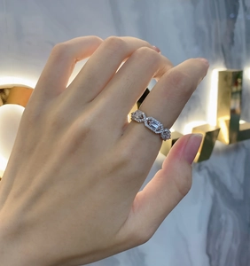 Detailed view of S925 silver ring featuring baguette and round cut zircon stones