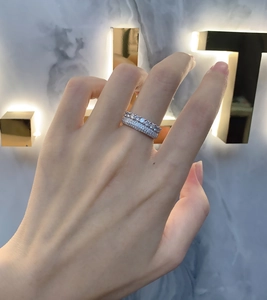 Close-up of double-layer S925 silver ring featuring round-cut pavé cubic zirconia