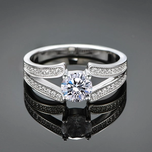Elegant S925 sterling silver V-edge ring featuring a round zircon and split shank with pave stones