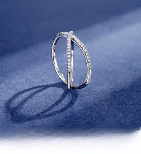 Detail of s925 silver ring featuring layered plating and shimmering zircon band