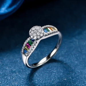 Sparkling silver ring with colorful rainbow zircons and round cluster diamond center