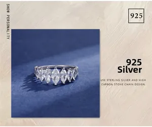 Detail view of seven marquise-cut carbon diamonds set in polished 925 sterling silver ring