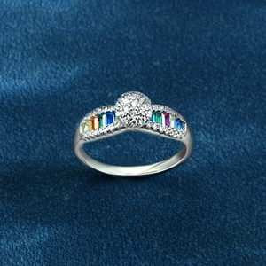 Rainbow gemstone silver ring with round micro-pave center on premium blue velvet