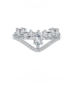 Macro view of V-shaped S925 silver ring featuring a pear-cut stone and micro-pave diamonds