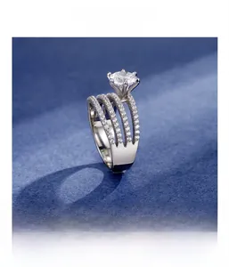 Macro detail of S925 silver multi-layer ring with six-prong set round moissanite