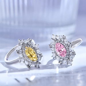 Luxurious S925 silver rings featuring yellow and pink marquise-cut stones in halo settings