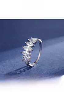 Macro detail of 925 sterling silver ring with seven marquise-cut 5A cubic zirconia stones