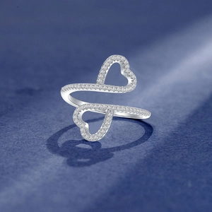 925 silver double heart open ring with white zircon stones on navy background