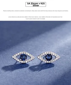 Macro detail of 925 sterling silver evil eye stud earrings with blue 5A cubic zirconia stones