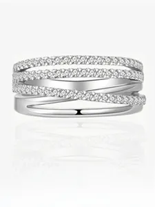 Macro shot of 925 silver multi-layer crisscross ring with micro-pave white cubic zirconia